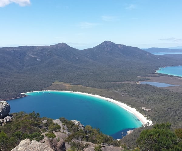 Looking at Wineglass Bay in the Freycinet National Park, from the top of Mount Amos.